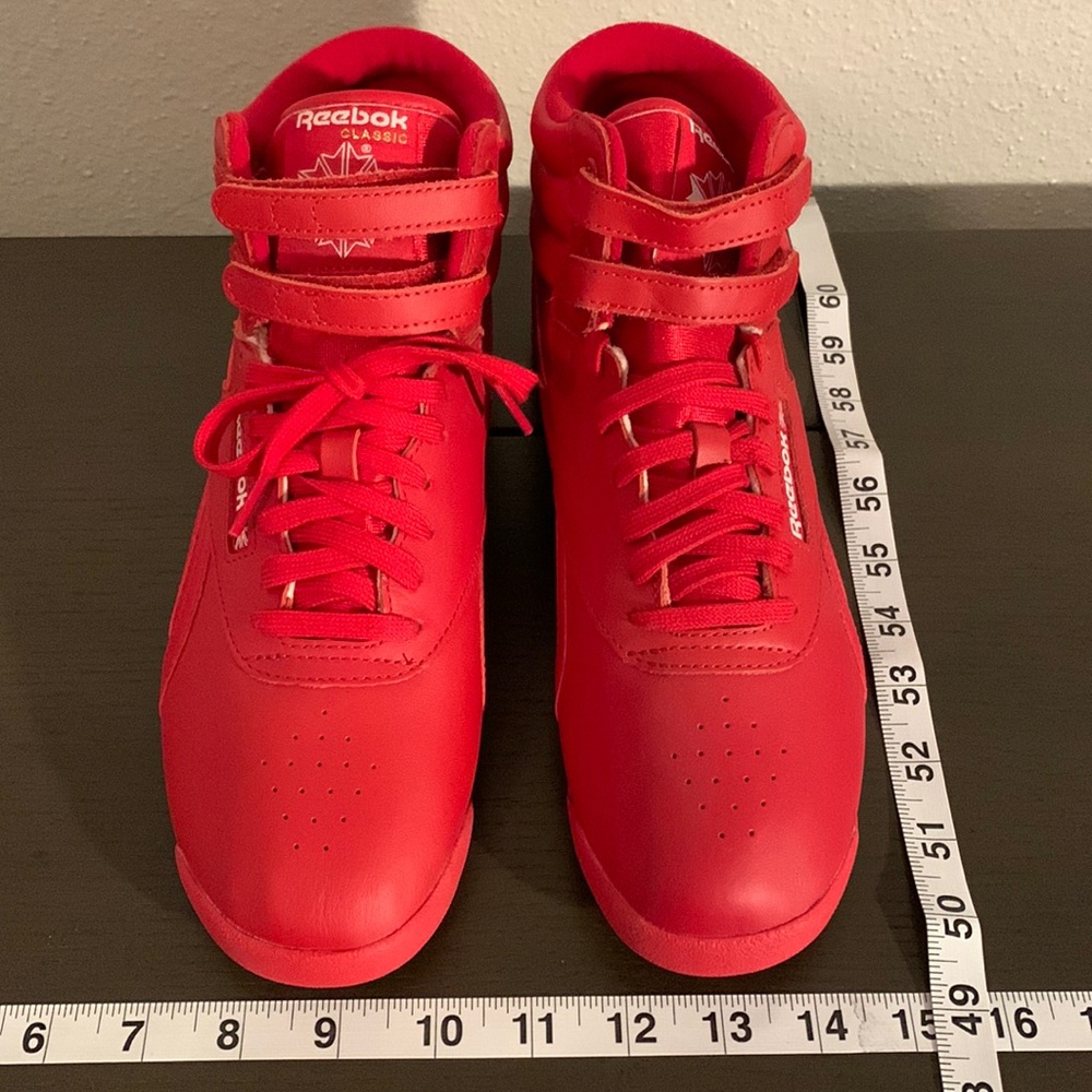 Reebok Freestyle Hi High-Top Sneaker - Women's.  Never worn.  No box.